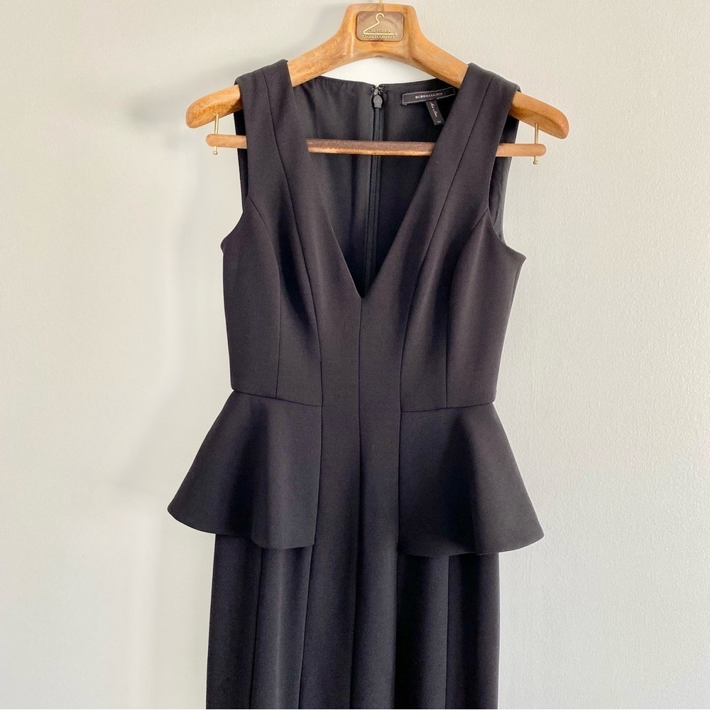 BCBG MaxAzria Elegant Black Deep V-Neckline Sleeveless Peplum Dress - Picture 2 of 8